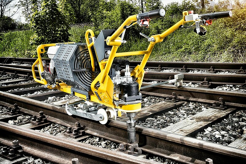 Rail mounted power wrench