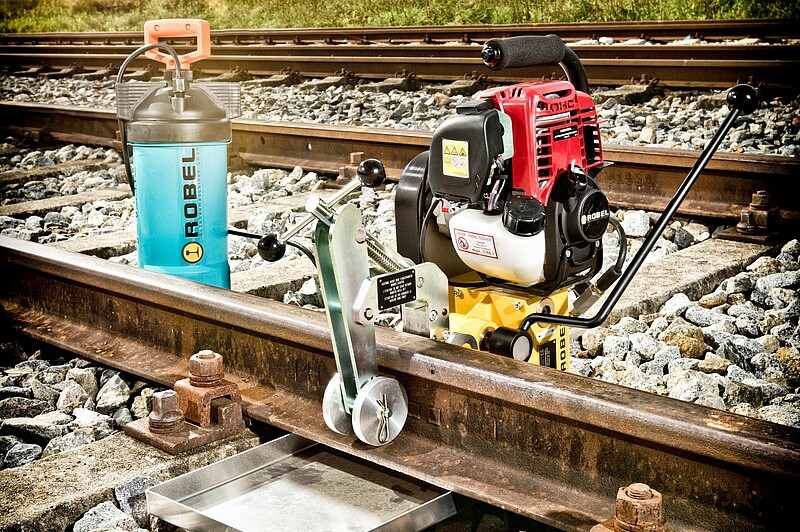 Rail drilling machine with petrol engine and coolant supply
